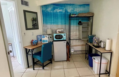 Cocoa Beach Apartment | The Dolphin Den- Blocks to the Beach and River~Kayaks and Bikes provided!