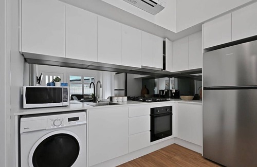 Orange Apartment | The Elm Apartments - The Orange Room