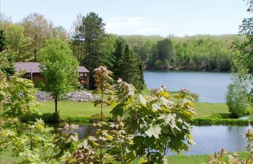 Upper Peninsula Michigan House | The Good Old Summertime - blue skies, green grass, and lovely water. Come enjoy!