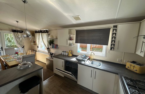 Tattershall Cabin | The Indulgence Lakeside Lodge is prime location with private fishing peg, sunken hot tub on Osprey