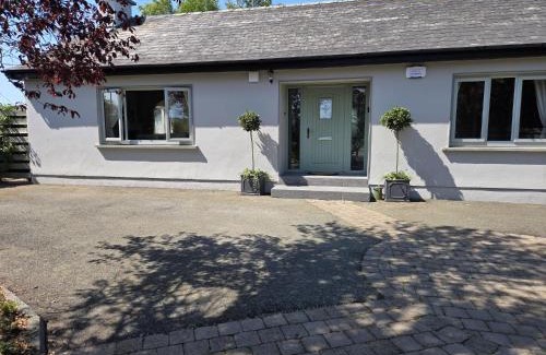 Camolin House | The Lazy Acre - Secluded Cottage with Garden & Sunset Views