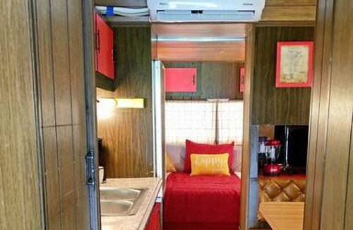 Bryson City RV Rental | The Lil' Red Caboose on the creek!