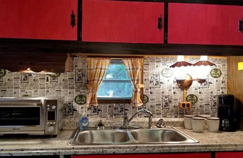 Bryson City RV Rental | The Lil' Red Caboose on the creek!