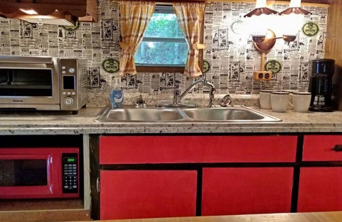 Bryson City RV Rental | The Lil' Red Caboose on the creek!