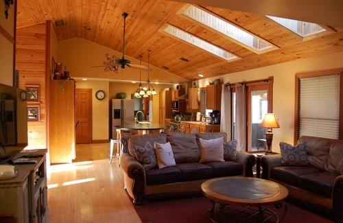 Logan Cabin | The Lodge at Harvest Moon sleeps 16 with five bedrooms and unique private Pub
