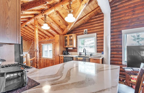 Gladwin Cabin | The Log Weekend: Cozy Up for a Crisp, Colorful Lakeside Escape