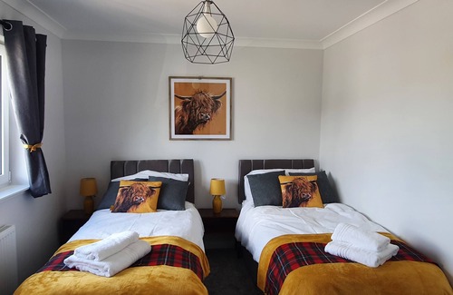 Aviemore Apartment | The MacGregor is a stylish pet friendly two bedroom apartment located in the center of Aviemore