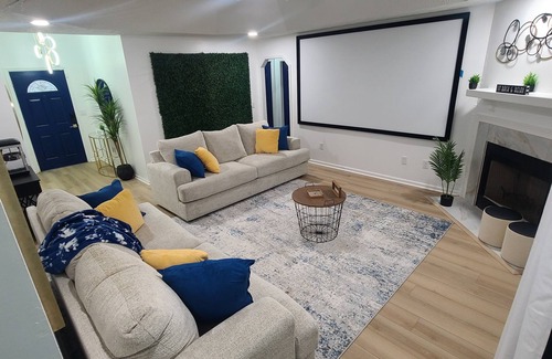 Columbus House | The Mini Golf Oasis king beds & Movie/Game room minutes to Fort Benning GA.
