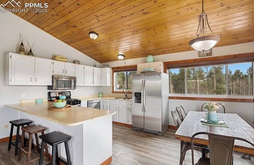Woodland Park House | The Minty Mountain Ranch. A serene rustic retreat on 5 acres! Sleeps 8