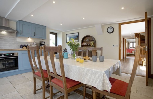 Northleigh Cottage | The Old Shippon at Bucknole Farm is a charming stone and slate barn conversion