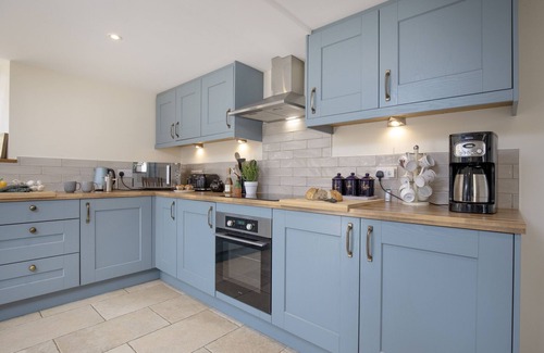 Northleigh Cottage | The Old Shippon at Bucknole Farm is a charming stone and slate barn conversion