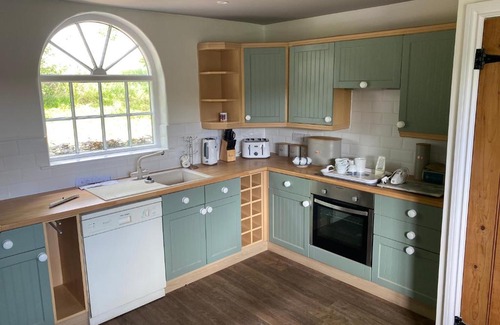 Gloucester House | The old vicarage coach house