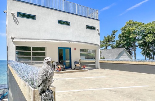 Holland House | The Only Property Offering Infinity Pool and Spa Overlooking Lake Michigan.