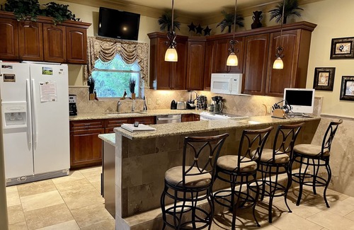 Comanche Trail House | The Palms - Waterfront with Dock/Near Oasis/Close to town/Pool Table/Hot Tub