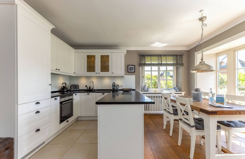 Tinnum Apartment | The spacious layout over two levels quickly makes you feel at home,