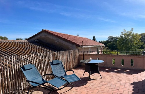 Saint-Esteve Apartment | The studio with its large, unoverlooked terrace, in a quiet location with private parking