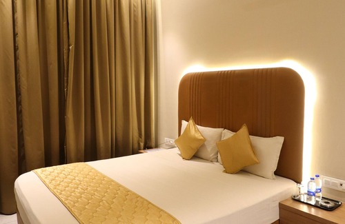 Malad West Hotel | The UBE Residency