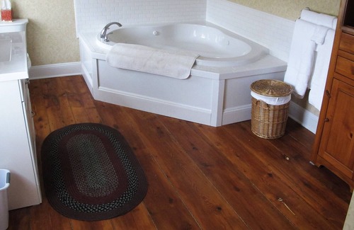 Ellenville House | The Wagar Suite is one of the two units in The Wagar Farm 1800's farmhouse. It is situated on 6 acres and overlooks the Beerkill stream. The Wagar Suite has the feel of an old farmhouse with all the modern conveniences including a whirlpool tub.