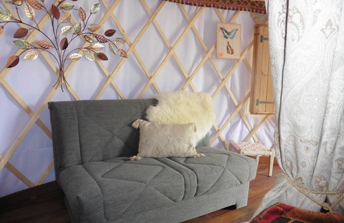 East Huntspill Ski Chalet | The Yurt - A modernised yurt with four poster bed and bathroom