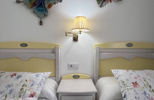 Almagro Apartment | Theater Retreat (Interior)