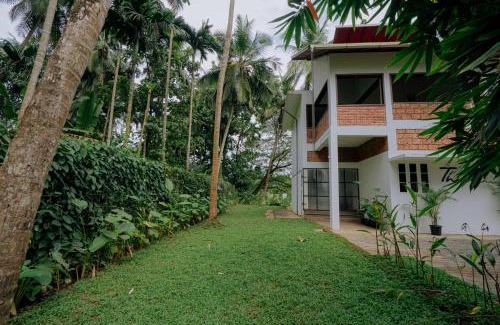Malappuram House | Thiraa Inn Nilambur By Hotelbuz