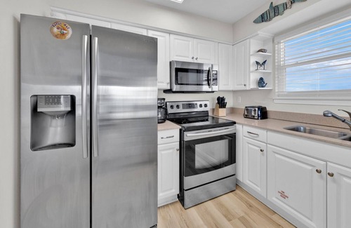 Seagrove Beach House | Third Floor End Unit, Beach service included, 2 chairs & 1 umbrella, Mar-Oct