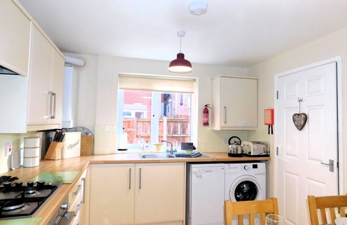 Sheringham House | This attractive modern holiday home is an ideal place to come relax & unwind throughout the year