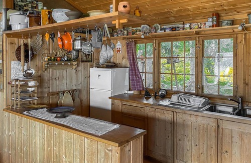 Vang House | This is a beautiful cottage with large windows and beautiful location on top of Grindaheim.