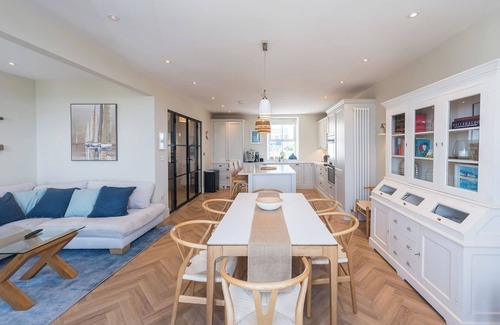 Rhosneigr Apartment | This recently renovated coastal oasis combines contemporary comfort with beach-chic style