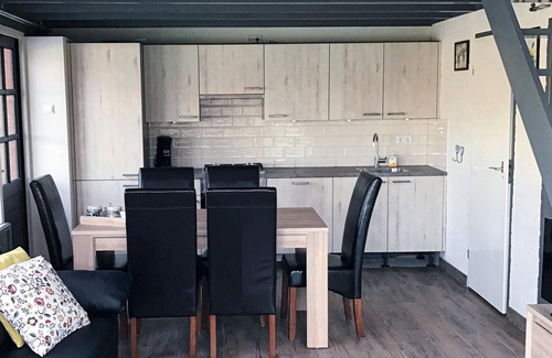 Stavenisse House | This vacation home in Zeeland is in a beautiful location near the water.