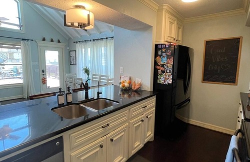 Galveston House | Tiki Paradise Water Front Home - 360° Oasis. Direct water access. Pet Friendly
