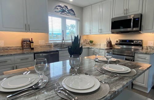Fort Myers Beach House | Times Square Gem! 4BR Canal front home, private Pool/Spa, Sleeps 12