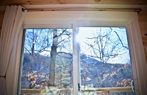 Todd House | Tiny Container Home Retreat with Hot Tub, Fire Table, Dining Area, and Views!