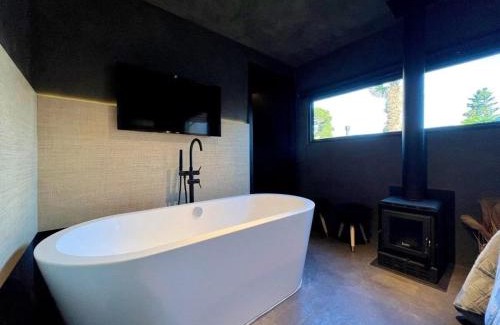 Vila Suica Apartment | Tiny House Grindelwald | Banheira + Lareira