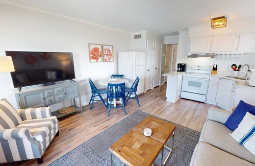 Tybee Island Condo | Top floor condo w. partial ocean + community pool views.
