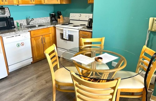 McCully - Moiliili Condo | Total of 2 bedrooms at Royal Kuhio, Sleeps 8, with AC. Two units, same floor,
