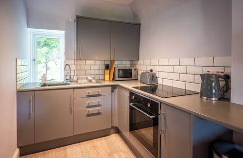 Oban House | Town Centre apartment with private garden
