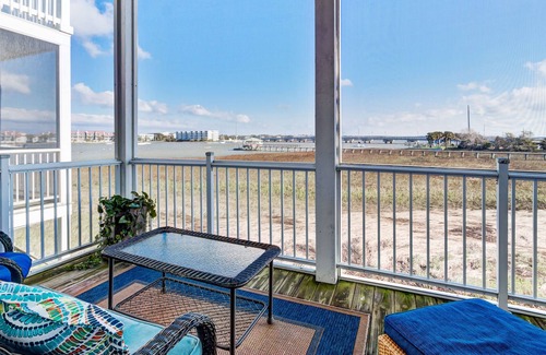 Waters Edge House | Townhouse with marsh and river views, shared pool, & outdoor shower