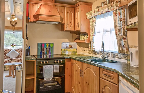 Dolgellau House | Traditional yet comfortable caravan with one double and two twins.