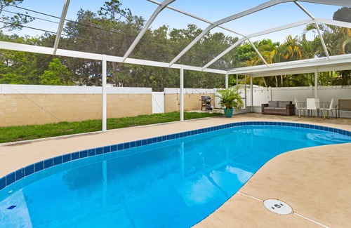 Walsingham House | Tranquil escape with screened pool, fenced yard, lanai, & Pinellas Trail access