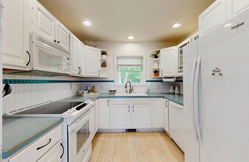 Mount Desert House | Tranquil lakefront cottage with a private dock, deck, grill, and WiFi