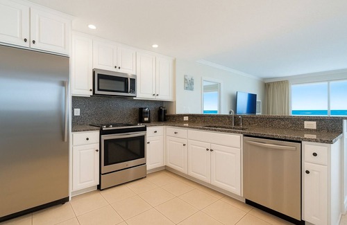 Lower Grand Lagoon Condo | Treasure Island Resort 9th Floor Beachfront Master, Pool, Jacuzzi & Beach Chairs