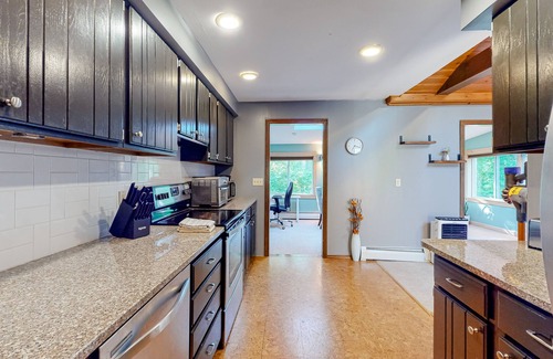 Damariscotta House | Tree-lined home with screened porch & perfect Midcoast location