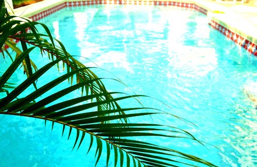 Haines City Villa | Tropical Disney Villa: Internet, pool, golf-view, games room &.a treasure hunt