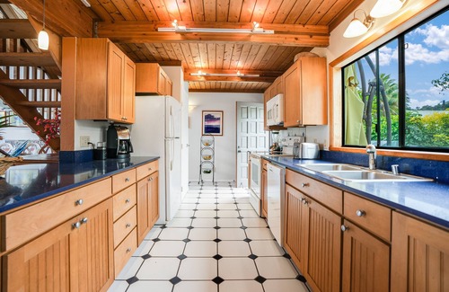 Kilauea House | Tropical home across from Anini Beach with amazing deck & small ocean view