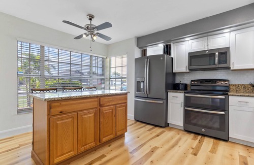 Buena Ventura Lakes House | Tropical Oasis Close to Orlando Airport with FREE Heated/Chilled Pool!