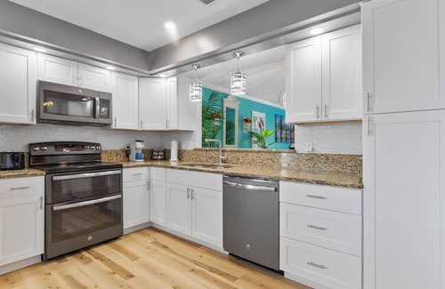 Buena Ventura Lakes House | Tropical Oasis Close to Orlando Airport with FREE Heated/Chilled Pool!