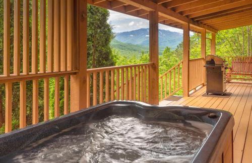 Gatlinburg - Pigeon Forge Ski Chalet | True Log Cabin With Stunning Views, Hot Tub, Sauna