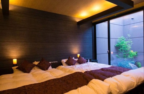 Oita Hotel | Twin beds tatami onsen openair jacuzzi bath/Oita Ōita