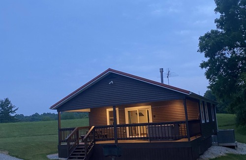 Logan Cottage | Two bedroom cabin with hot tub and sunset views